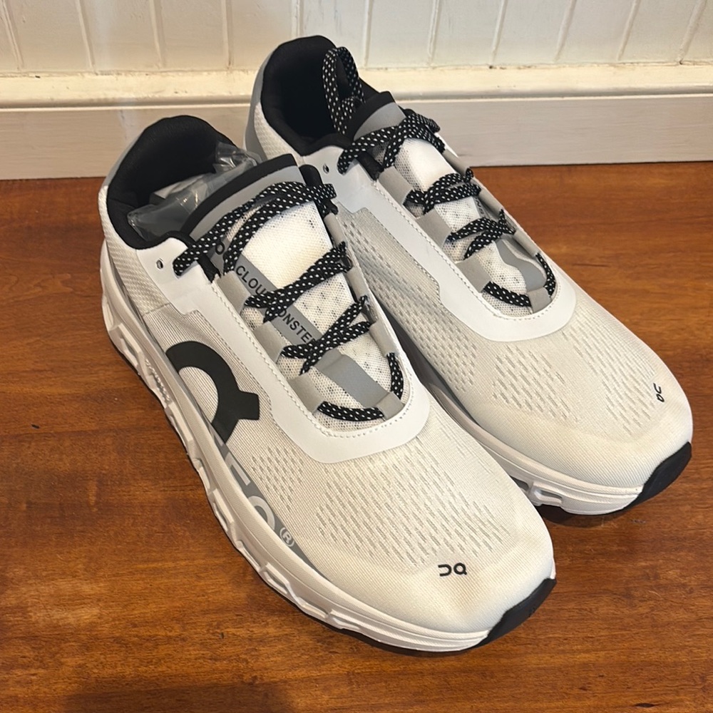 On Running White and Black Athletic Shoes with Minimalist Design